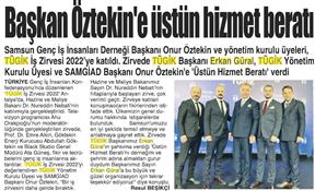 Onur Öztekin e  Üstün Hizmet Beratı .